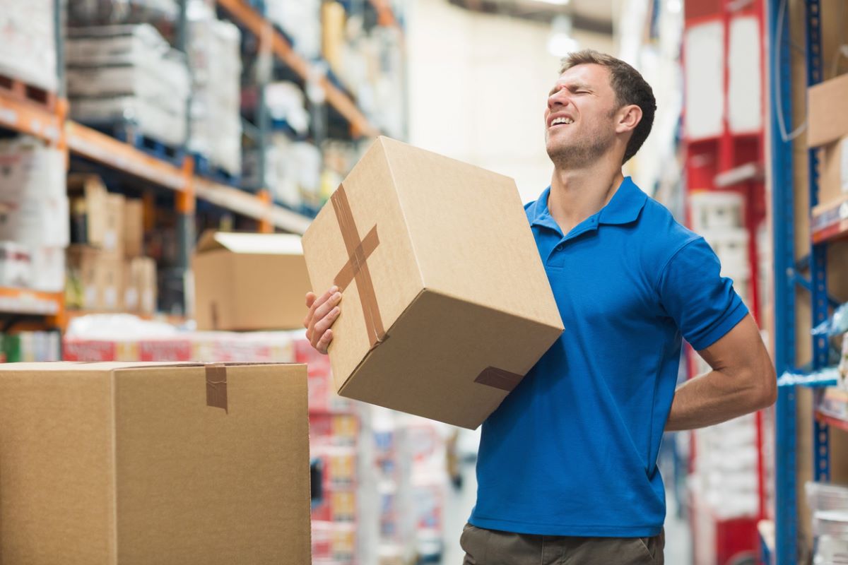 Back pain warehouse worker istock wavebreakmedia 470939108